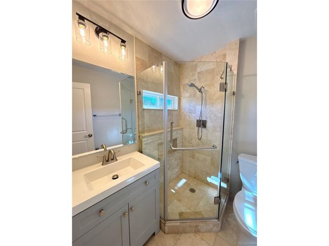 7038 W Frost Pl, Littleton, CO 80128