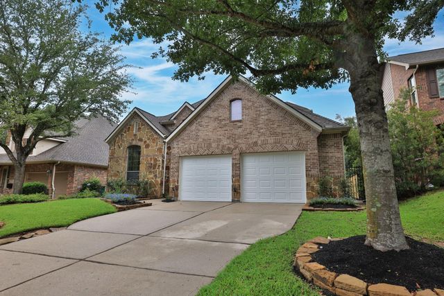 7 Woodmoor Place, Magnolia, TX 77354