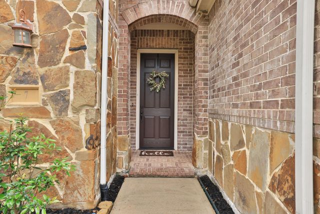 7 Woodmoor Place, Magnolia, TX 77354