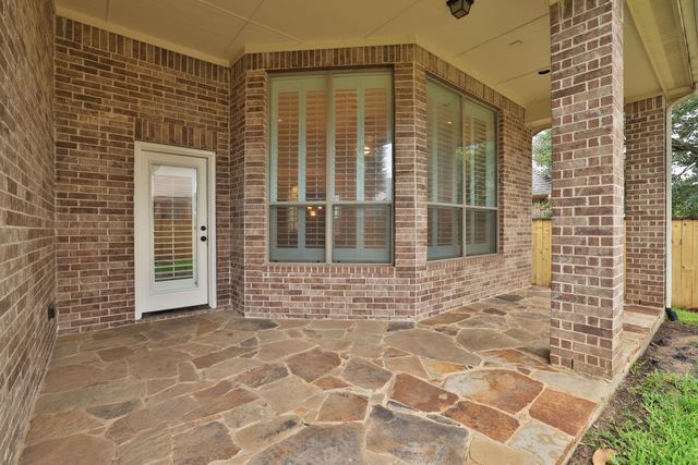 7 Woodmoor Place, Magnolia, TX 77354