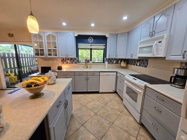 13870 Magnolia Court, Davie, FL 33325