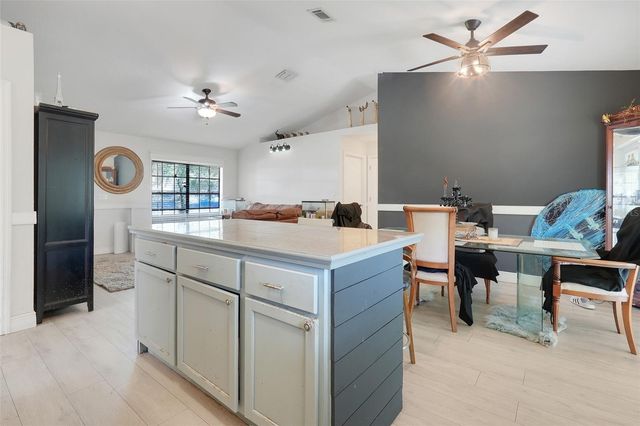 207 HOWARD COURT, Mascotte, FL 34753