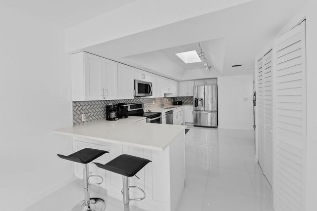 7369 Orangewood Lane 303, Boca Raton, FL 33433