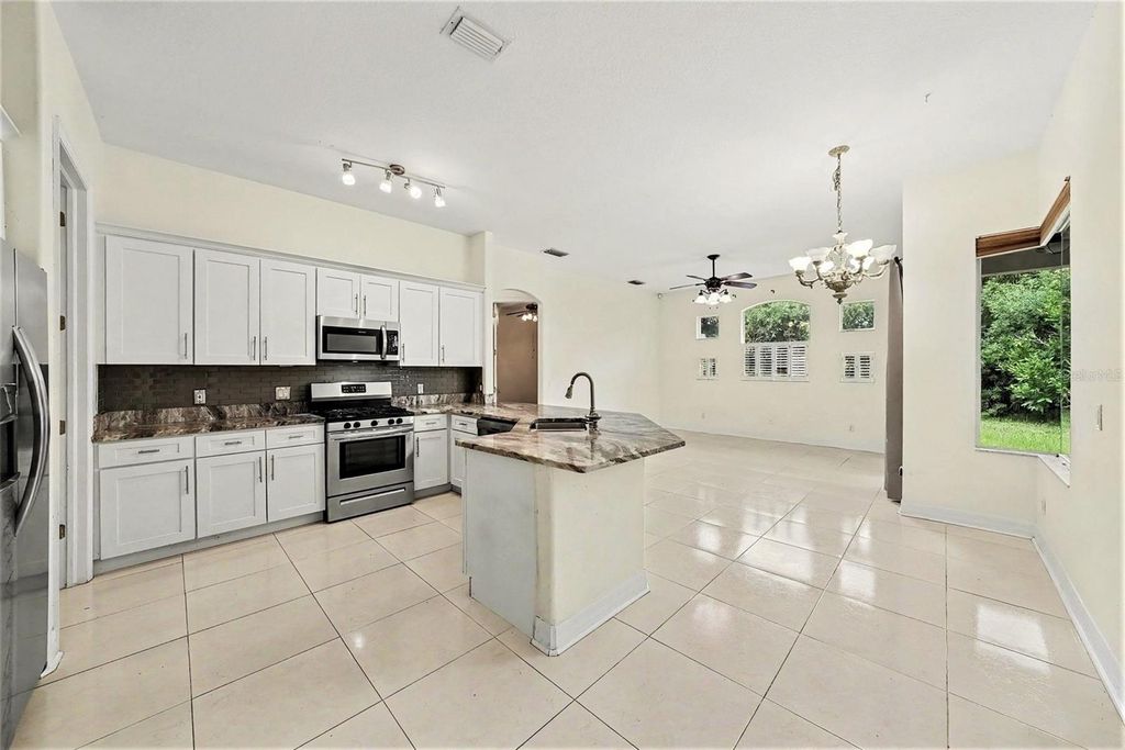 Image 3 of property listing at 12516 LEATHERLEAF DRIVE, Tampa, FL 33626