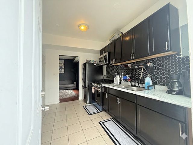 4829 S CHAMPLAIN Avenue, Chicago, IL 60615