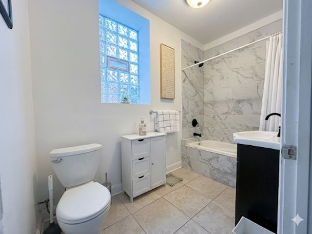 4829 S CHAMPLAIN Avenue, Chicago, IL 60615
