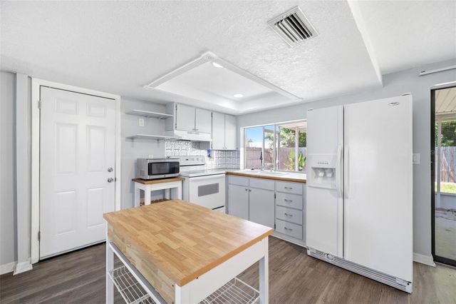 3303 WILLIAMSBURG LOOP, Holiday, FL 34691