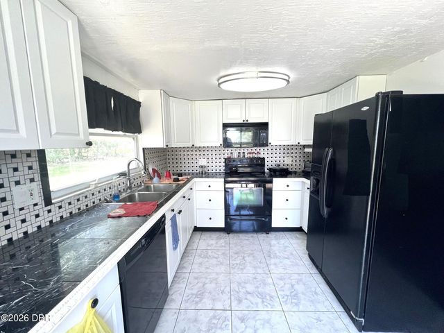 201 S Gaines Street, Oak Hill, FL 32759