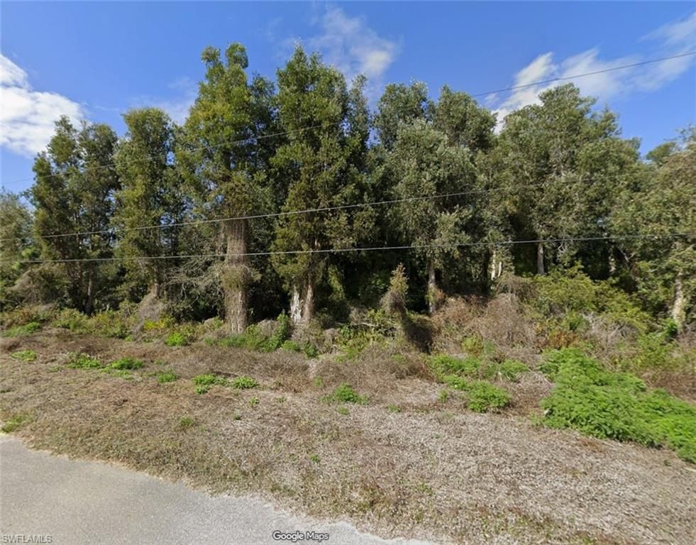 2704 36th ST SW, LEHIGH ACRES, FL 33976 — exterior