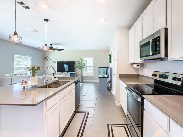 1042 JOHN JACOB ROAD, Davenport, FL 33837