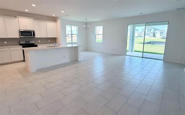 6736 SPOTTED EAGLE LOOP, Howey In The Hills, FL 34737