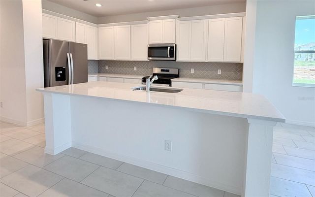 6736 SPOTTED EAGLE LOOP, Howey In The Hills, FL 34737