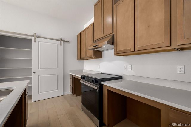 6153 N Ceylon Street 106, Denver, CO 80249