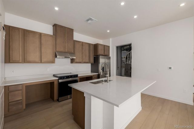 6153 N Ceylon Street 106, Denver, CO 80249