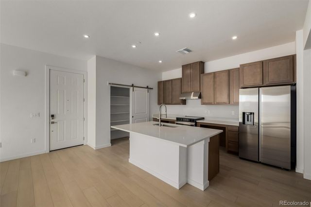 6153 N Ceylon Street 106, Denver, CO 80249