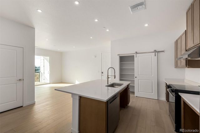 6153 N Ceylon Street 106, Denver, CO 80249