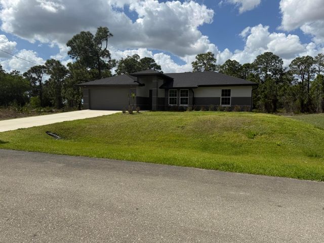 1046 Cheney Avenue S, Lehigh Acres, FL 33974