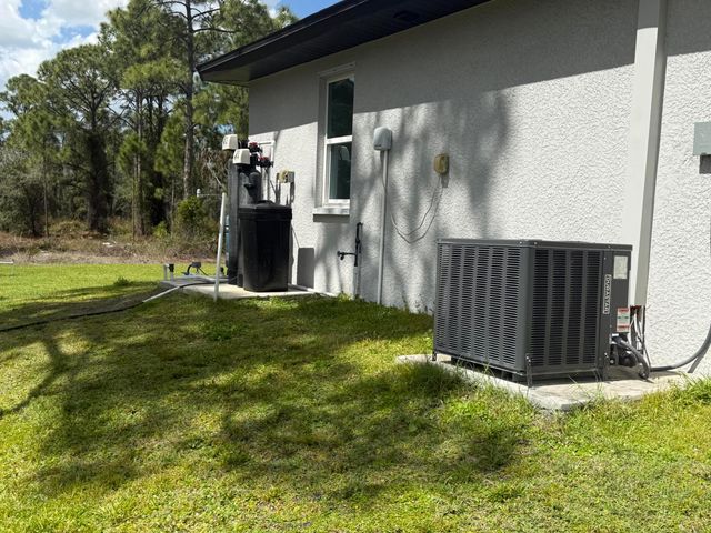 1046 Cheney Avenue S, Lehigh Acres, FL 33974