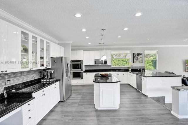 9921 NW 60th Pl, Parkland, FL 33076