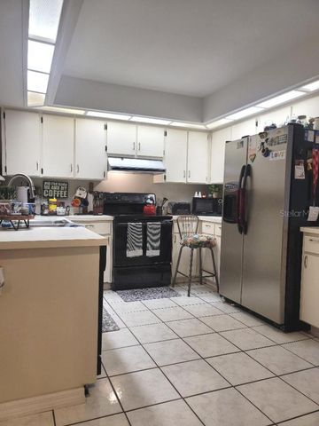 9736 CYPRESS SHADOW AVENUE, Tampa, FL 33647