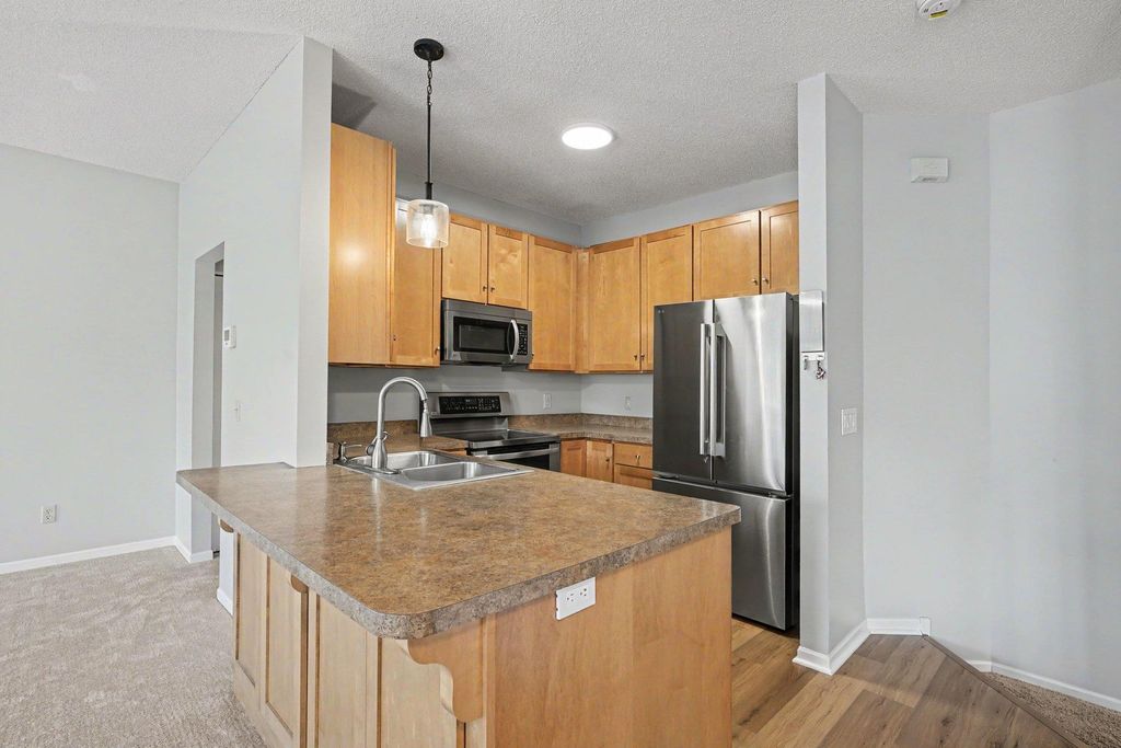679 Woodduck Drive H, Woodbury, MN 55125 — photo 4