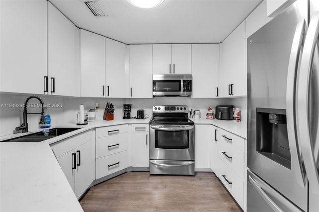 12909 SW 64th Ln, Miami, FL 33183