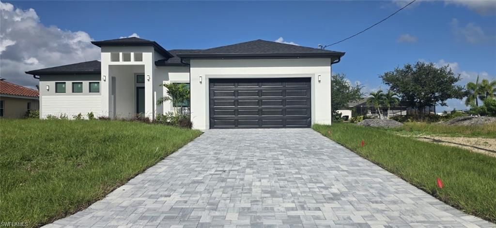 1032 NW 33rd PL, CAPE CORAL, FL 33993 — exterior