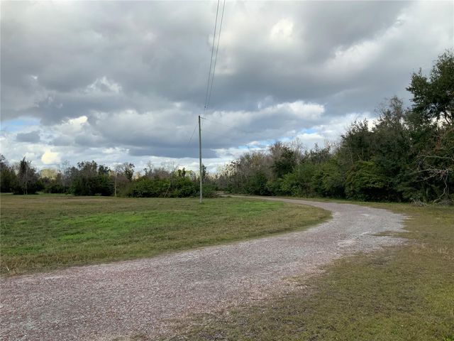 12301 WOODLEA ROAD, Tavares, FL 32778