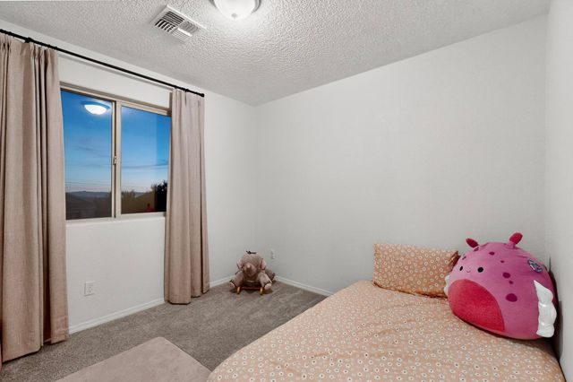 236 El Camino Loop NW, Rio Rancho, NM 87144