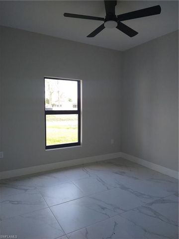 712 THEODORE VAIL ST E, Lehigh Acres, FL 33974