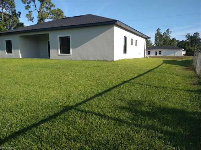 712 THEODORE VAIL ST E, Lehigh Acres, FL 33974