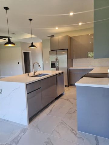 712 THEODORE VAIL ST E, Lehigh Acres, FL 33974