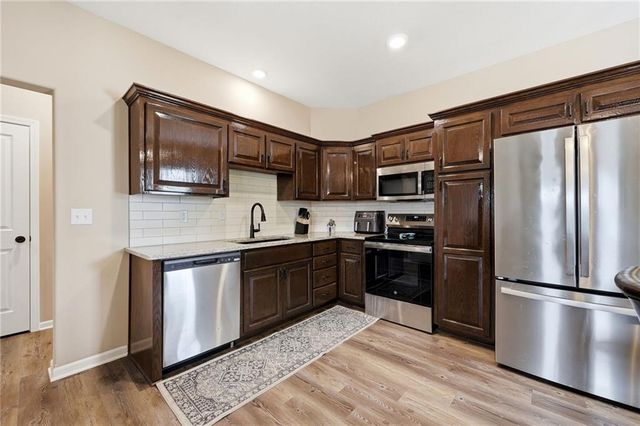 1102 White Oaks Lane, Oak Grove, MO 64075