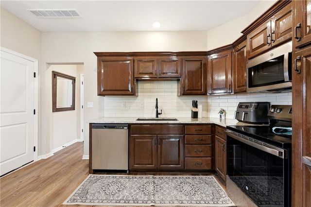1102 White Oaks Lane, Oak Grove, MO 64075