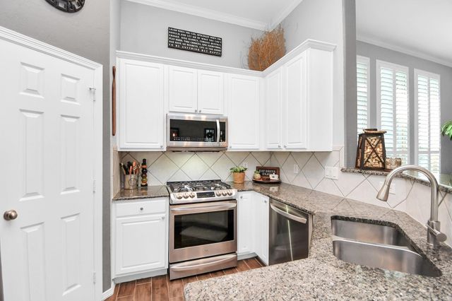 8624 Sunset Loch Drive, Spring, TX 77379