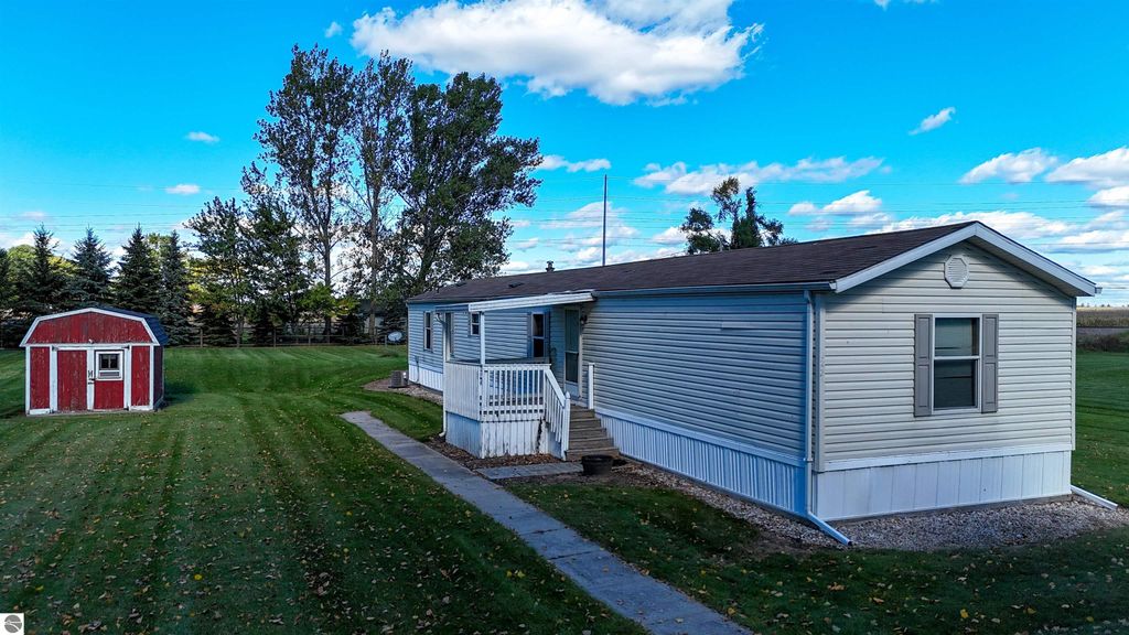 Image 1 of property listing at 6065 E Millbrook Road, Mt Pleasant, MI 48858
