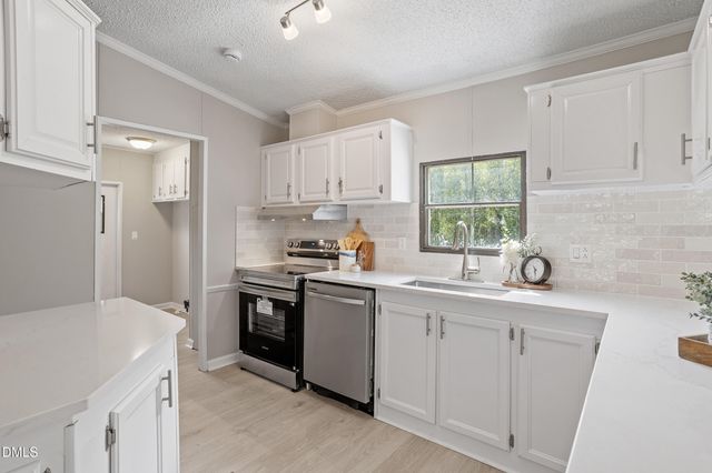 6133 Heath Hawkins Court, Willow Spring, NC 27592