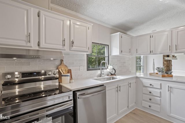 6133 Heath Hawkins Court, Willow Spring, NC 27592