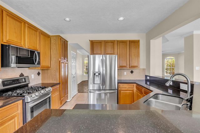 12018 Natural Bridges Lane, Sugar Land, TX 77498