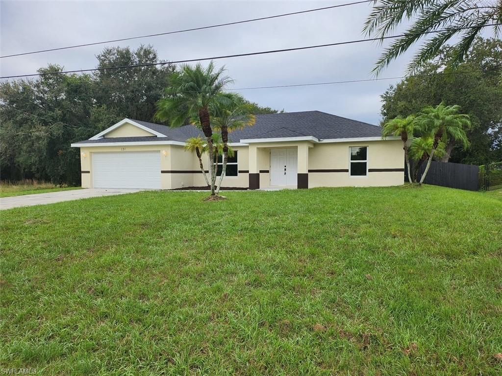 131 Grant BLVD, LEHIGH ACRES, FL 33974 — exterior