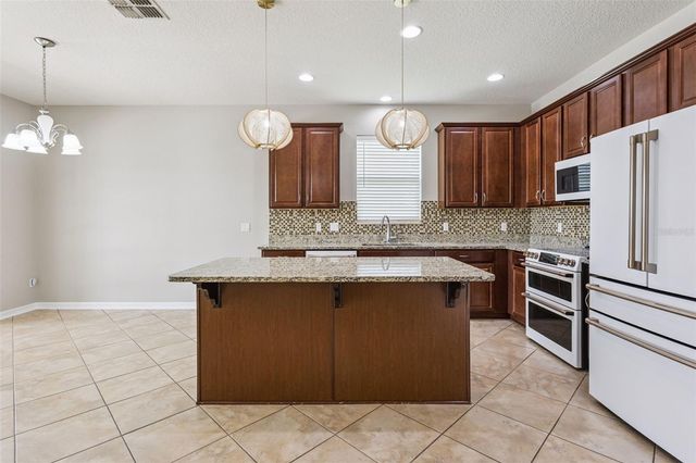 205 MYSTIC BAY COURT, Groveland, FL 34736