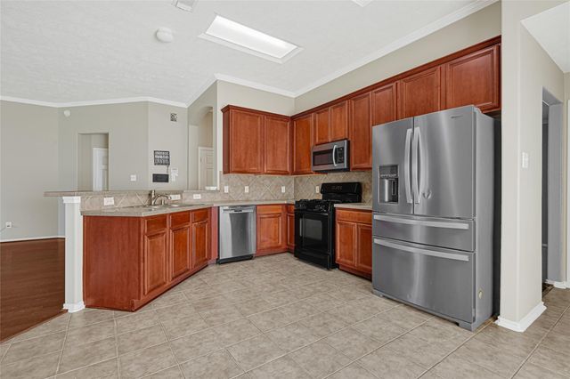 12838 Cooper Breaks Drive, Humble, TX 77346