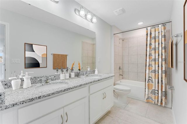 12977 TROVITA DRIVE, Grand Island, FL 32735