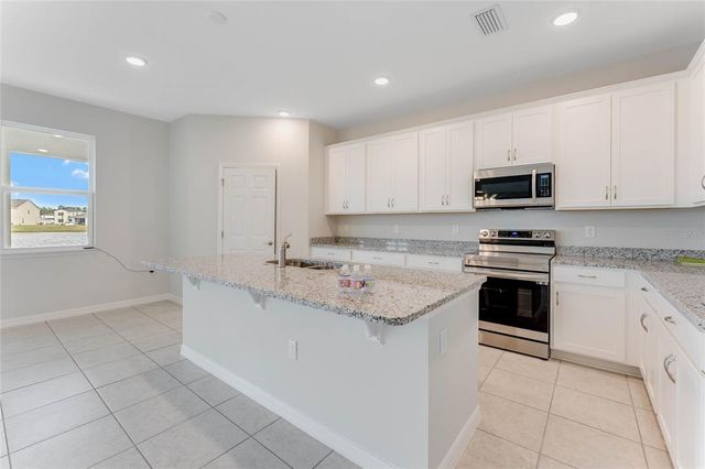 12977 TROVITA DRIVE, Grand Island, FL 32735