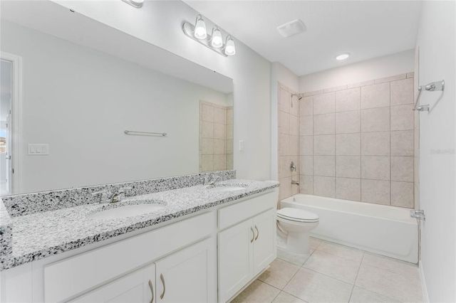 12977 TROVITA DRIVE, Grand Island, FL 32735