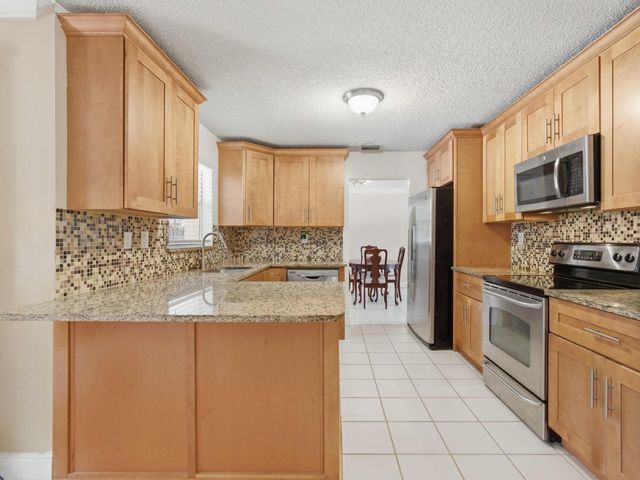 150 Valencia Street, Royal Palm Beach, FL 33411