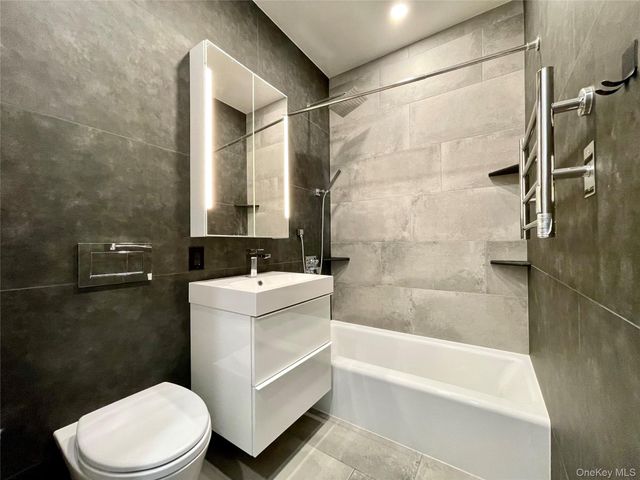 7153 69th Place, Glendale, NY 11385