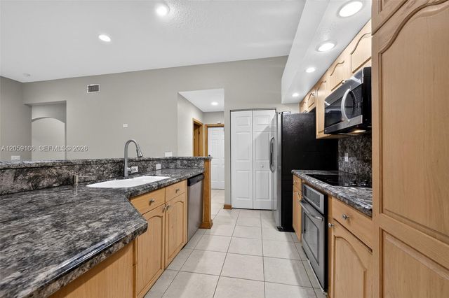 6020 NW 67th Court, Parkland, FL 33067