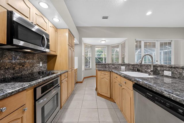 6020 NW 67th Court, Parkland, FL 33067