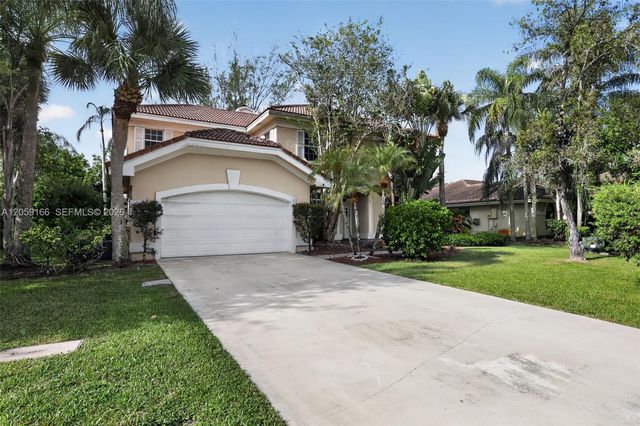 6020 NW 67th Court, Parkland, FL 33067